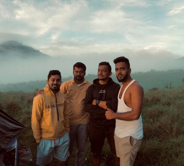 Campers enjoying sunrise camping experience at Haritha Kanda